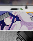 Bright orange anime desk pad 40x20 inches with deep navy hair and sparkling purple eyes, playful mood.