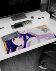 Anime girl desk pad 36x16 inches showing hoodie girl tugging her cap with a pouty caught-you-staring look.