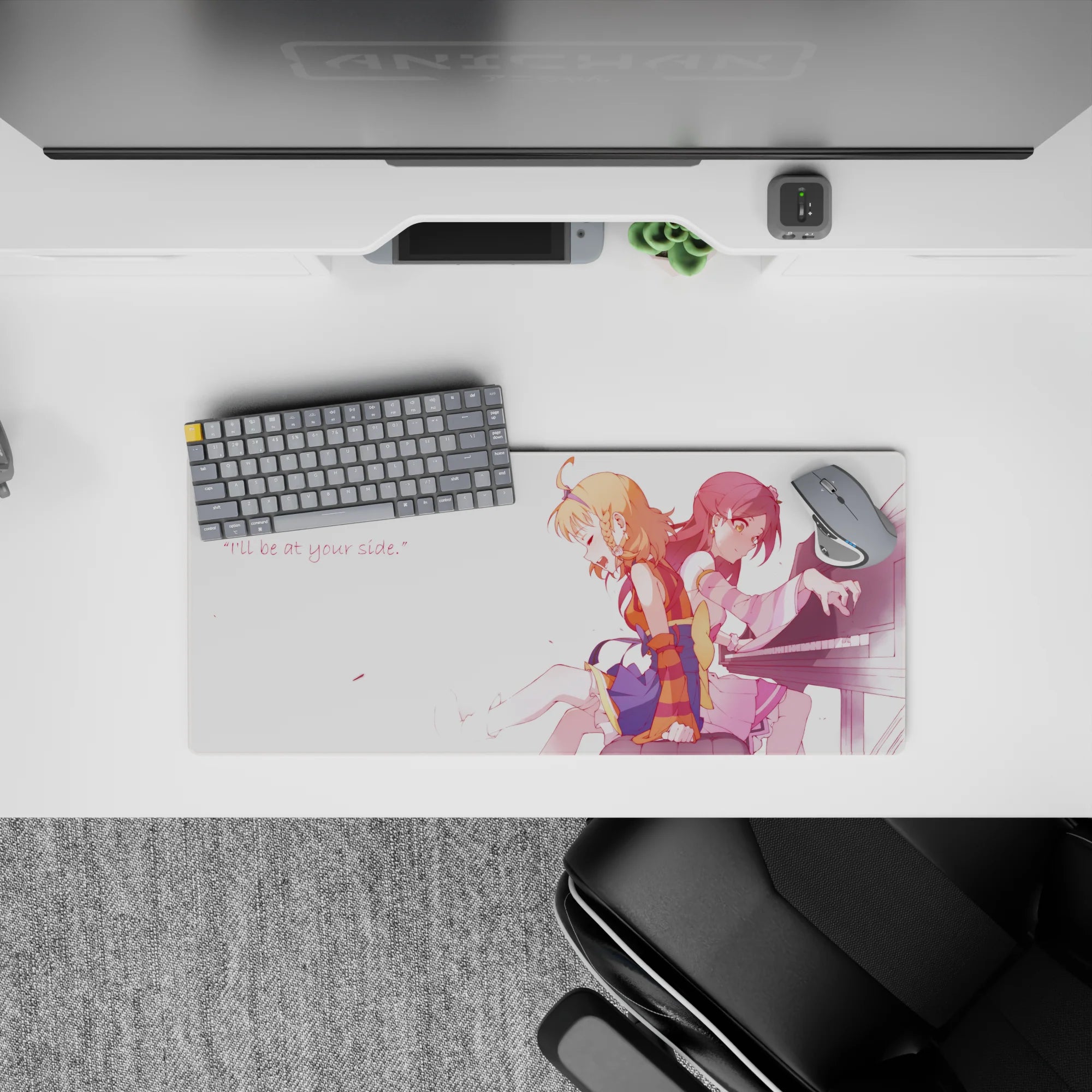 Soft pink anime desk mat mouse pad 28x12 inches, peach and crimson hair, petal flecks, cozy mood.