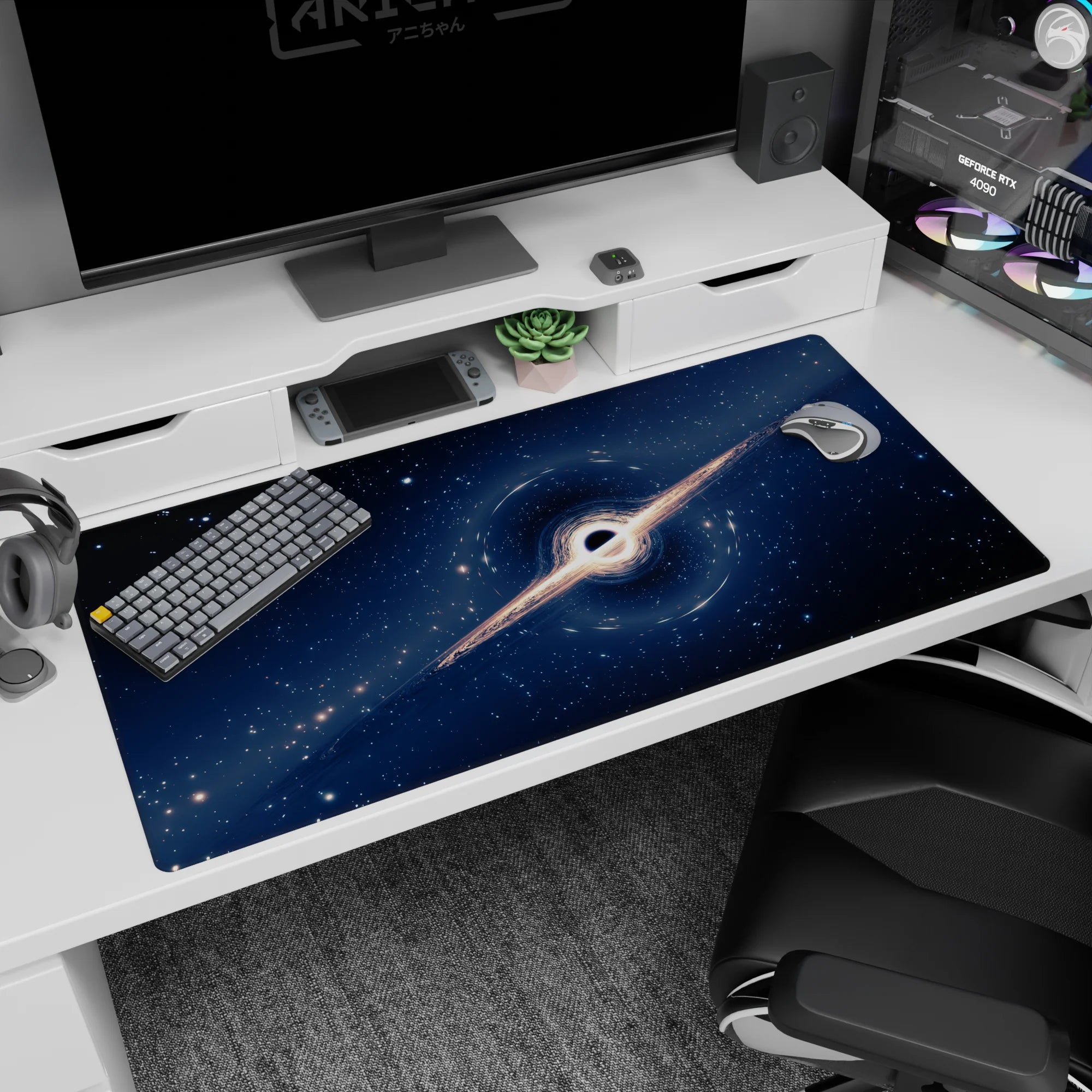 Cosmic desk pad 40x20 inches featuring a swirling black hole design with deep navy and starlit accents.