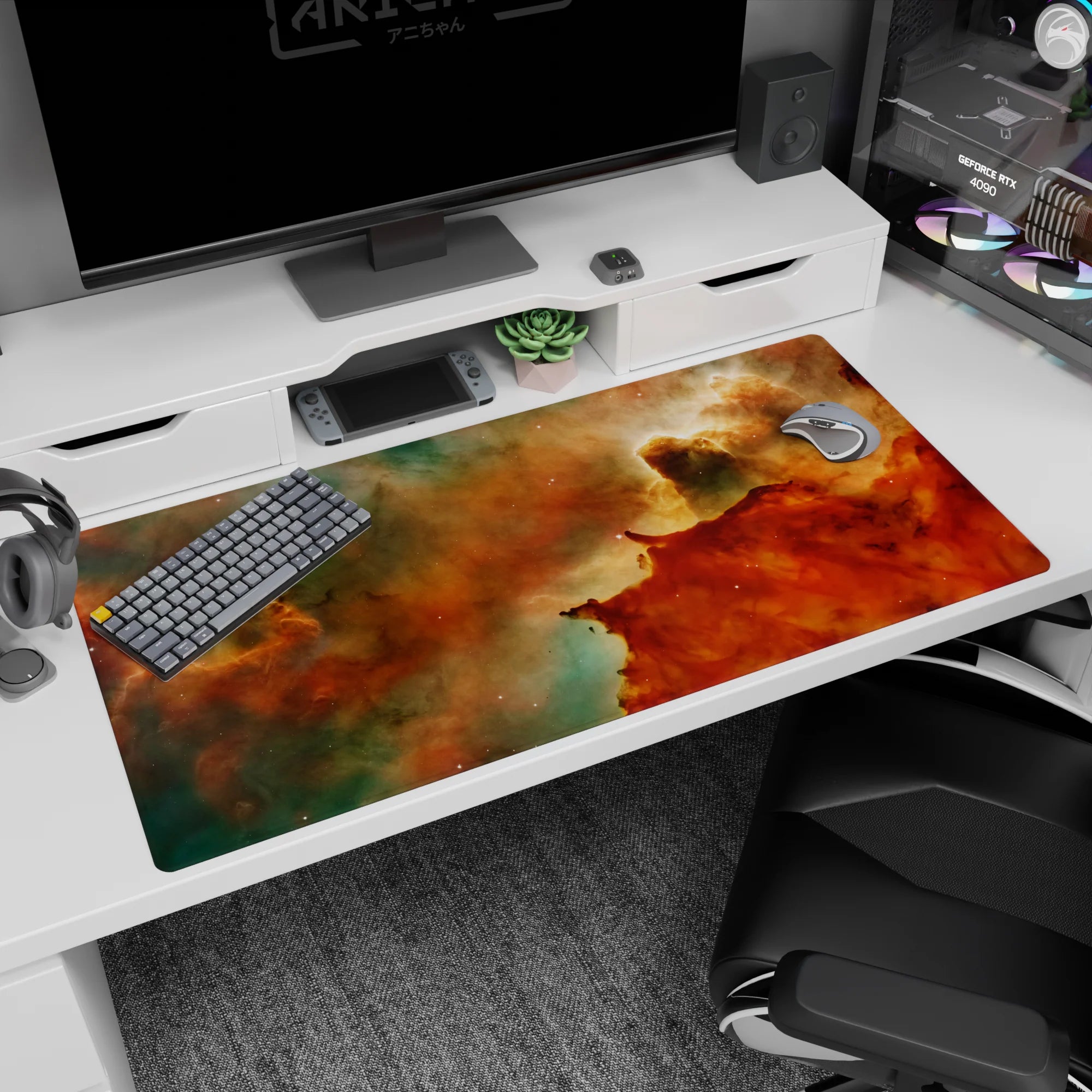 Cosmic gradient desk pad with teal, amber, and orange nebula design, 40x20 inches, adds warmth to workspace.
