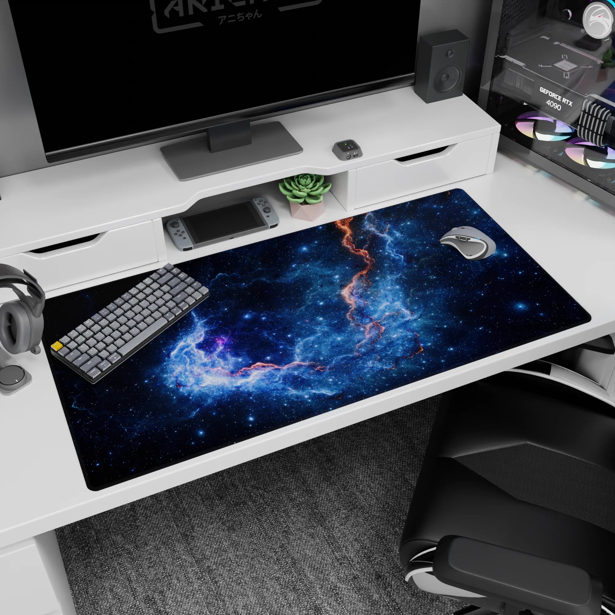Galaxy-themed desk pad 40x20 inches with deep space design, glowing orange seam, and smooth surface for work or gaming.