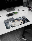 28x12 inches anime girl desk mat close-up with pale blonde bangs, frosty hood pulled tight, snow flecks.