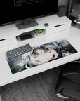 Close-up hooded blonde anime girl in snowfall mouse pad 32x12 inches, glossy violet-blue eyes, frosty hood.