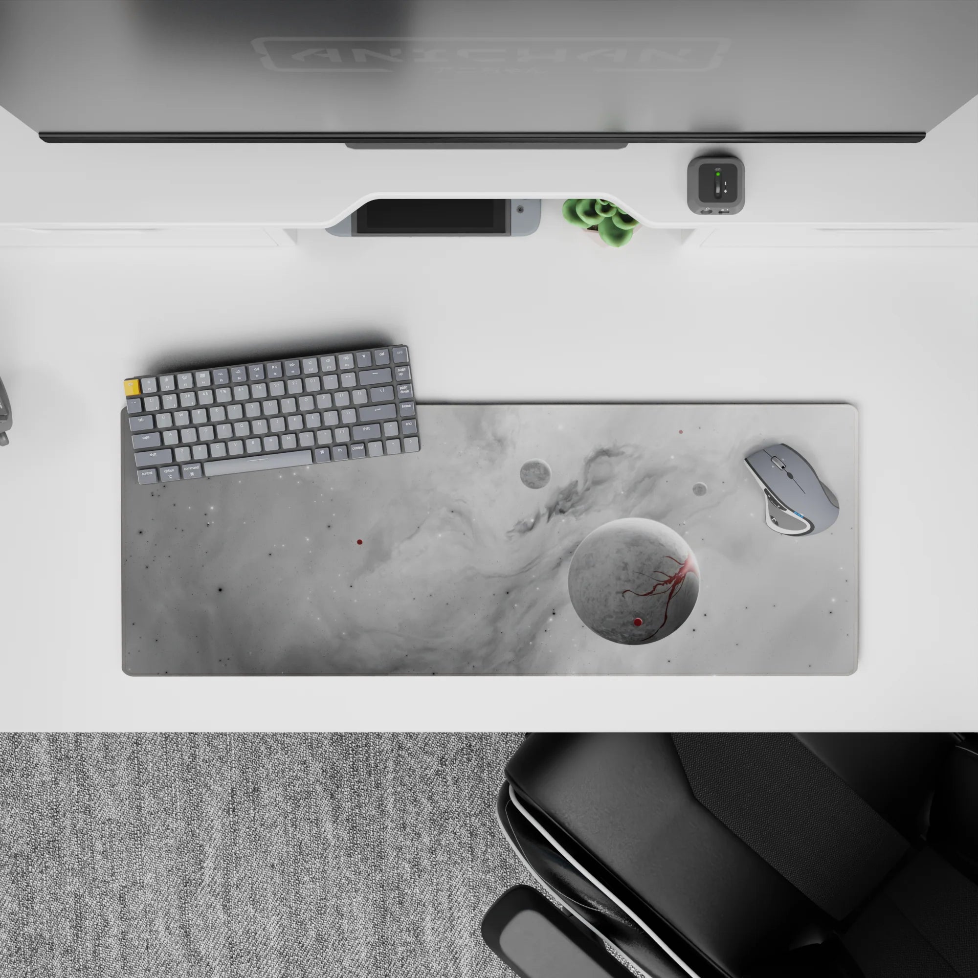 Large 32x12 inch desk mouse pad with misty gray cosmic clouds, soft planets, and subtle red accent specks.