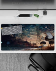 32x16 inches anime desk pad in blue, peach, and gold sunset tones with a quiet, cinematic mood.