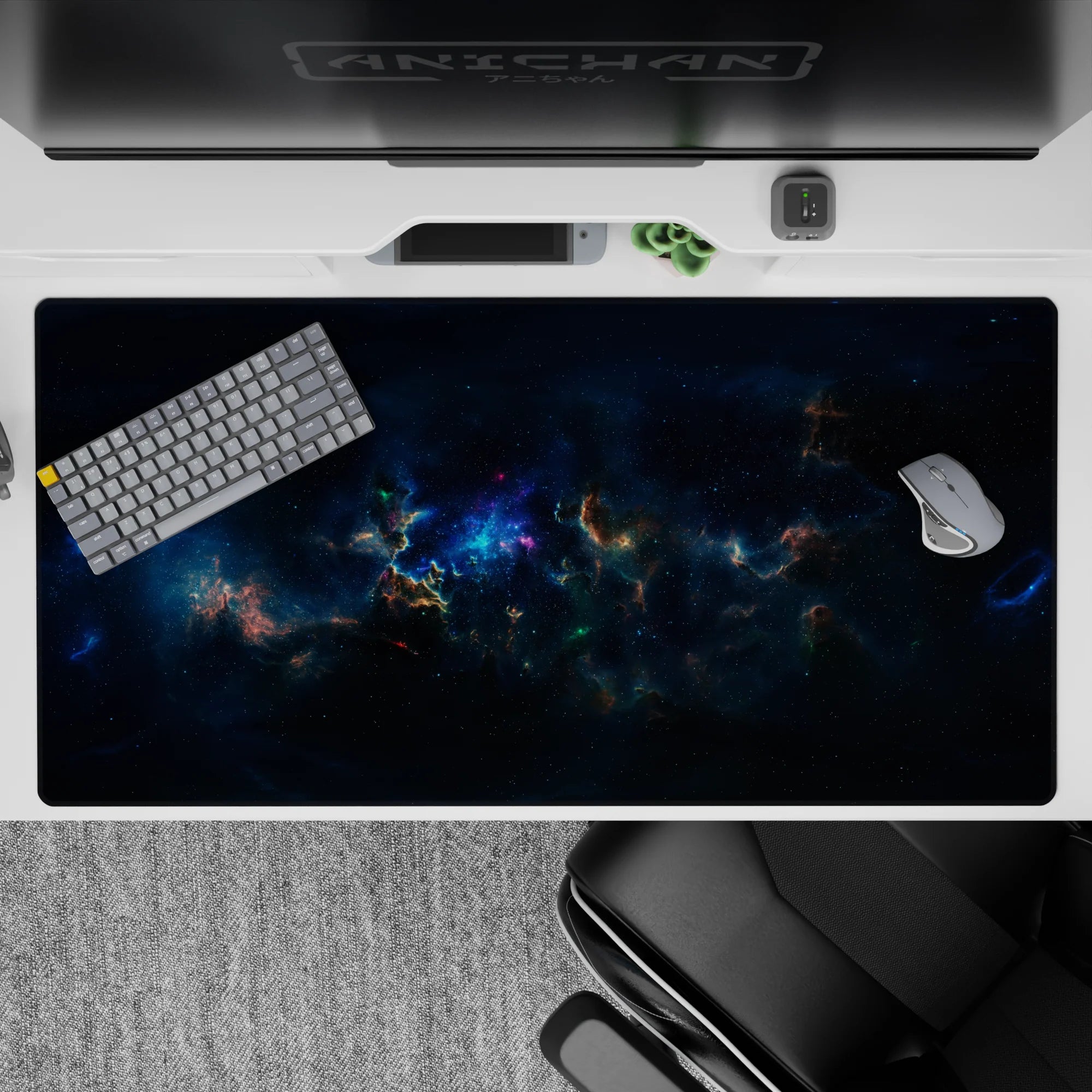 Large 40x20 inch desk pad featuring a dreamy nebula design with swirling navy, teal, and magenta tones.