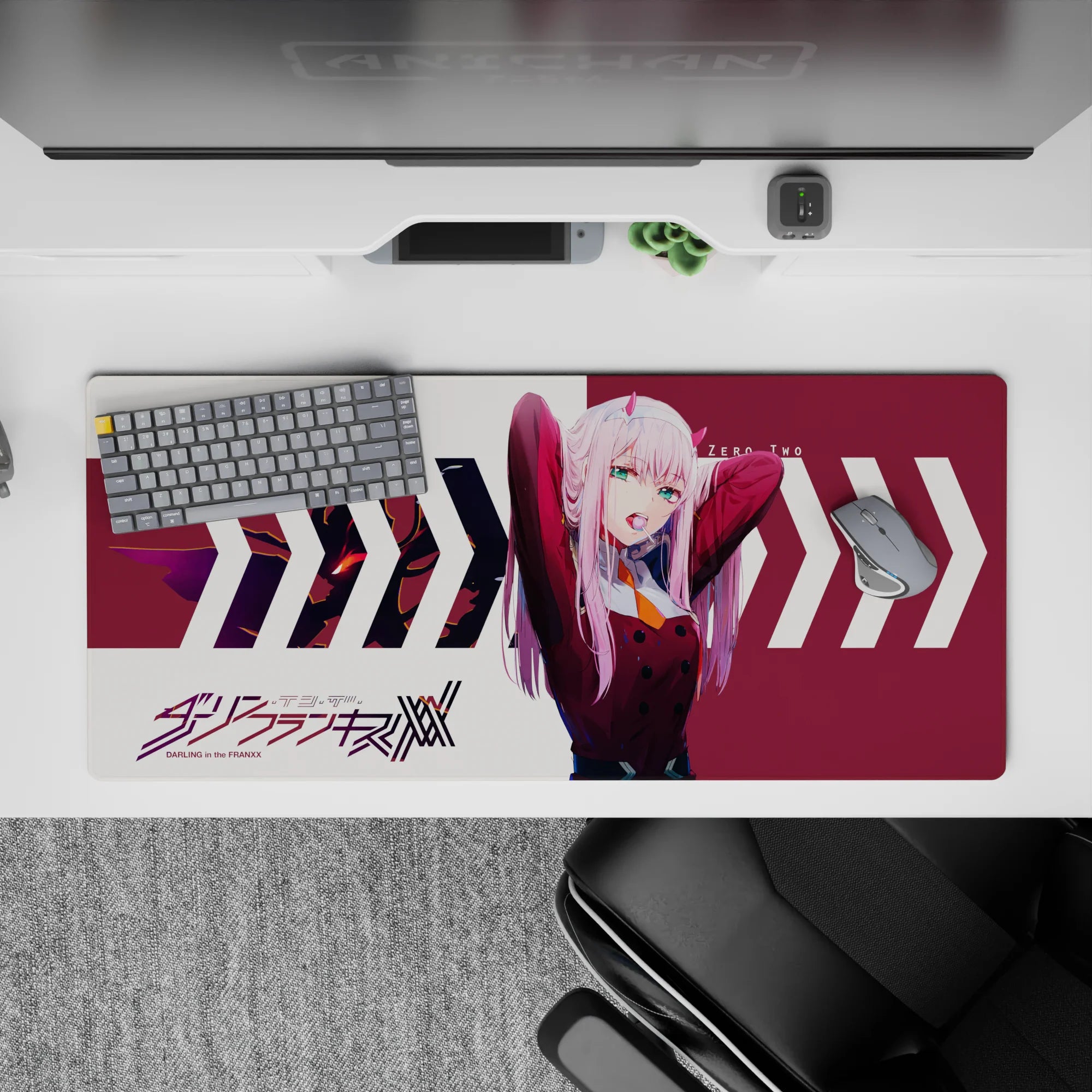 36x16 inches desk pad with Zero Two from Darling in the Franxx, exuding fierce energy and dynamic flair in vibrant colors.