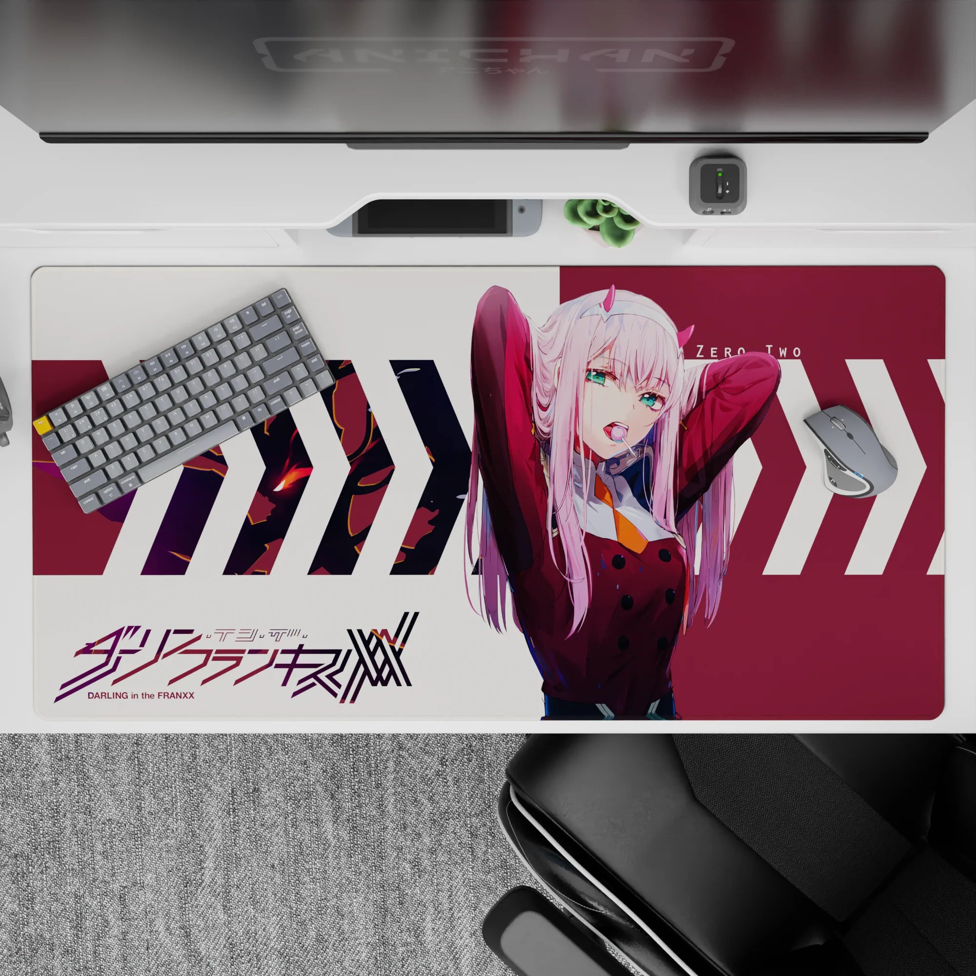 40x20 inches desk pad with Zero Two from Darling in the Franxx, showcasing her fierce energy and dynamic pose in vibrant colors.