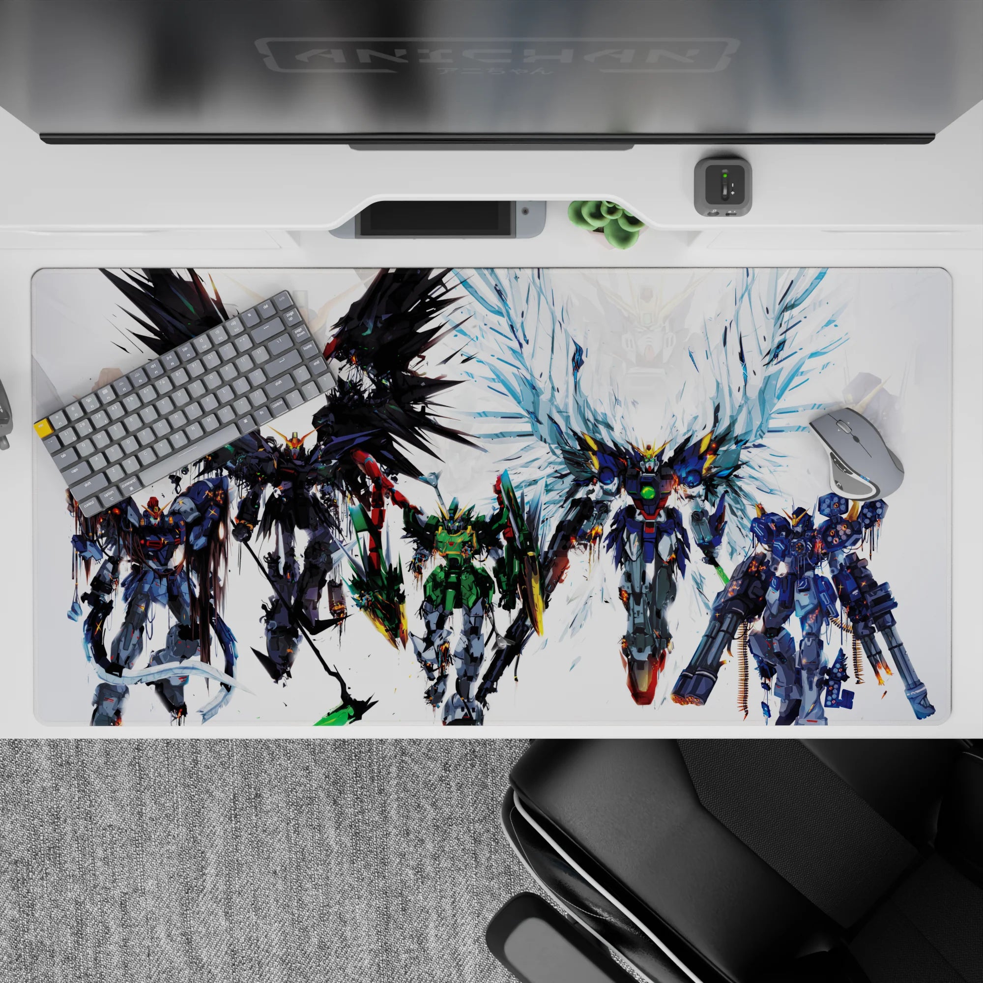 Black, green, and steel-gray mecha desk pad with icy blue wing flares, 40x20 inches.