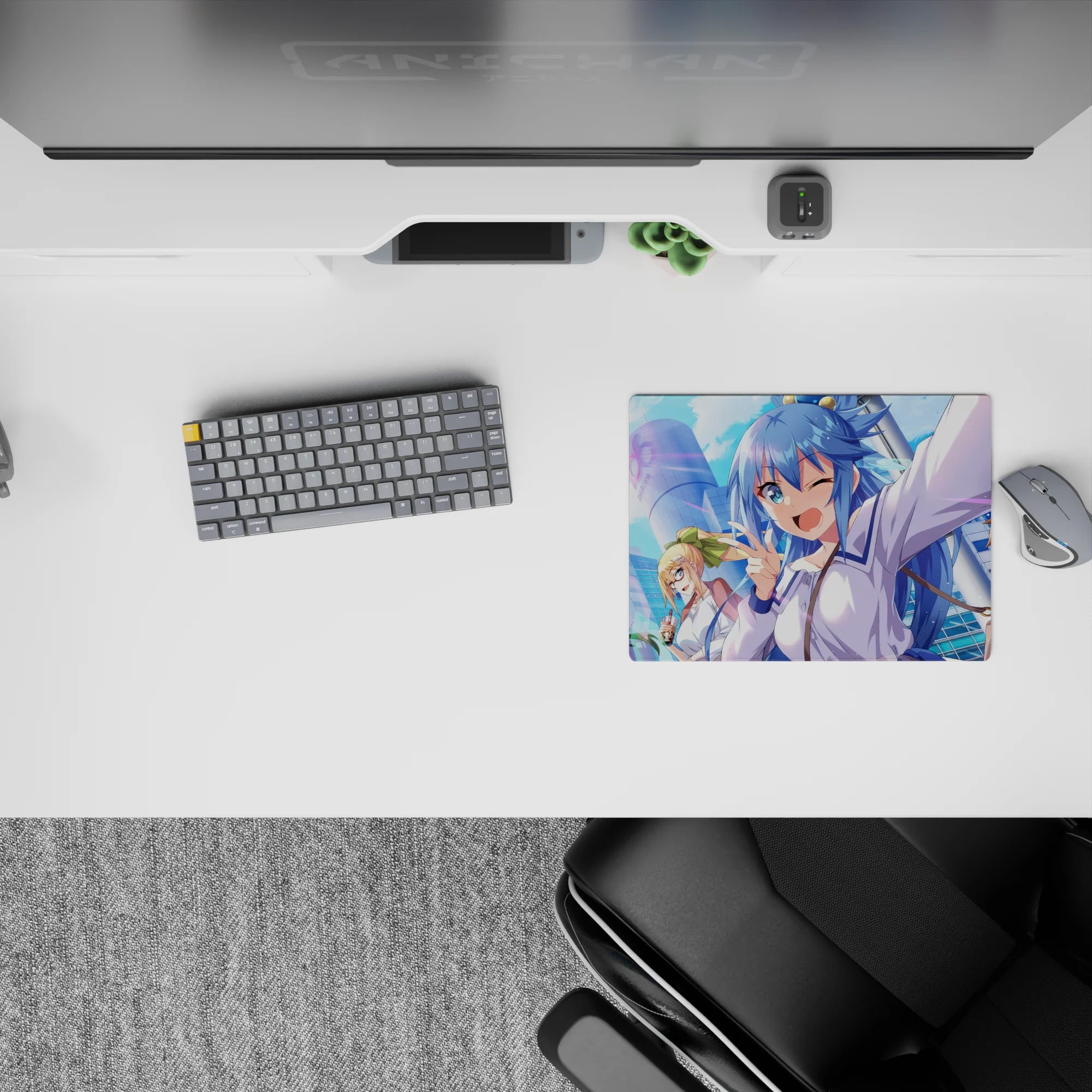 Anime mouse pad 14x10 inches featuring KonoSuba&#39;s Aqua, Megumin, Darkness, and Kazuma with vibrant cityscape.