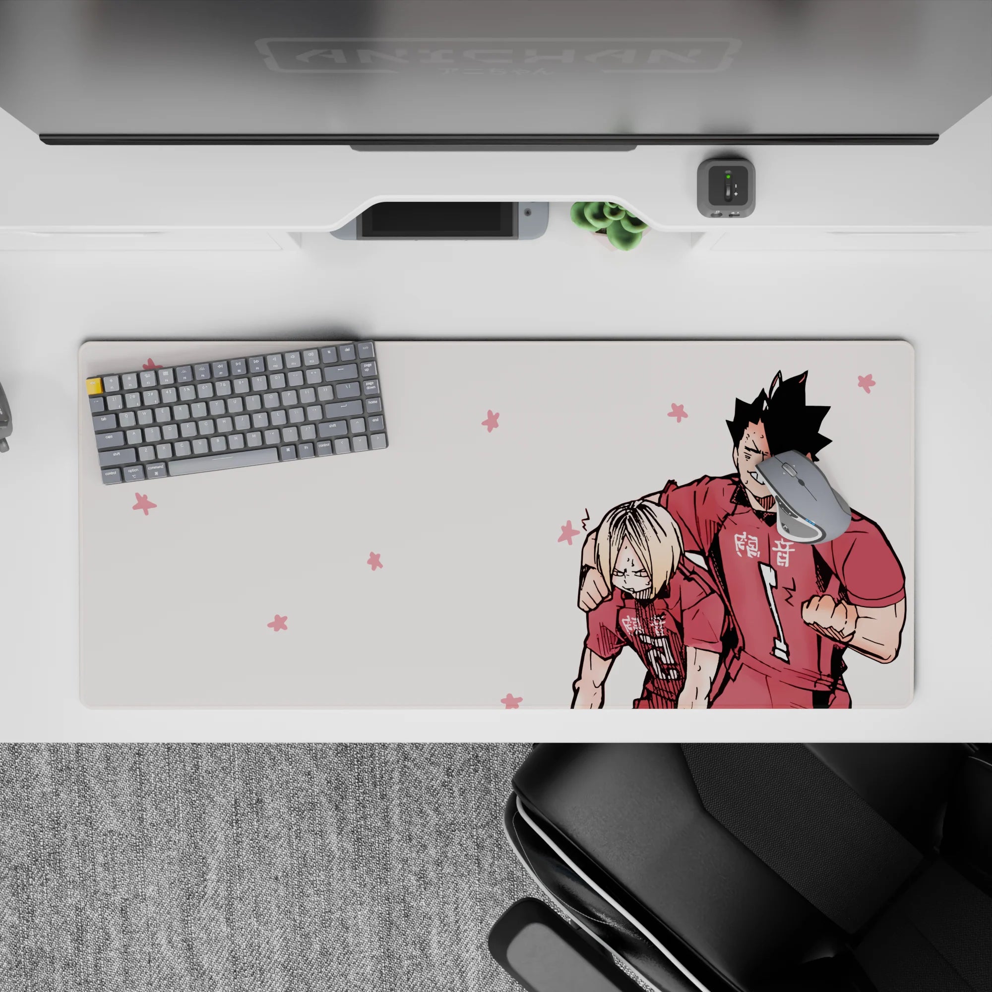 36x16 inches anime mouse pad in soft pink with flower icons, crisp lines, playful victory vibe.