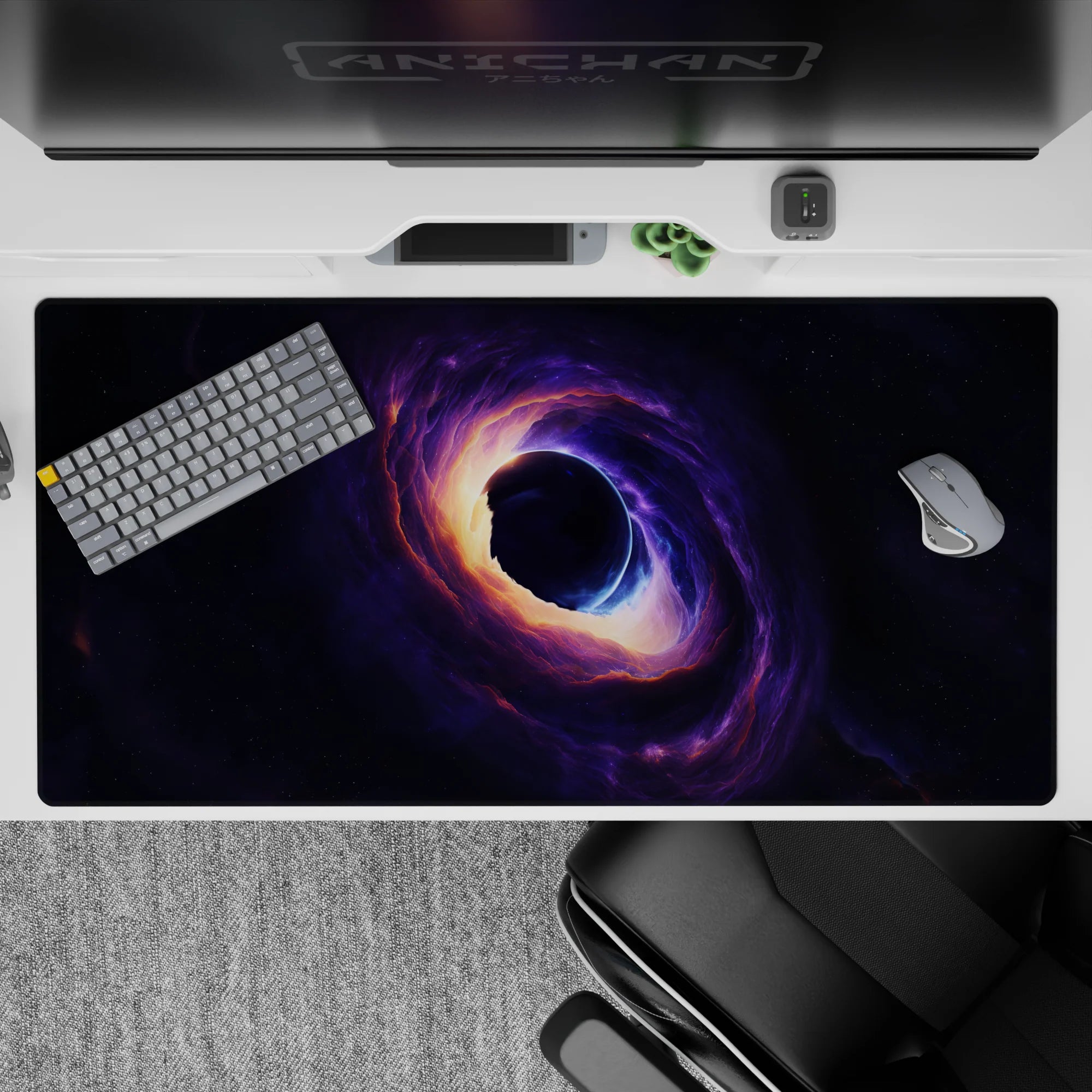 Cosmic themed desk pad 40x20 inches with swirling violet, blue, and amber tones creating a vivid galaxy design.