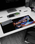 Revy from Black Lagoon 36x16 inches desk pad, wild grin and dual pistols mid-motion city-night scene.
