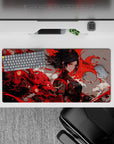 Anime girl mouse pad 32x16 inches in rich crimson, smoky white, and charcoal tones, fierce dramatic vibe.