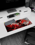28x12 inches anime girl mouse pad showing calm warrior with midnight hair and tassel earrings in a red storm.