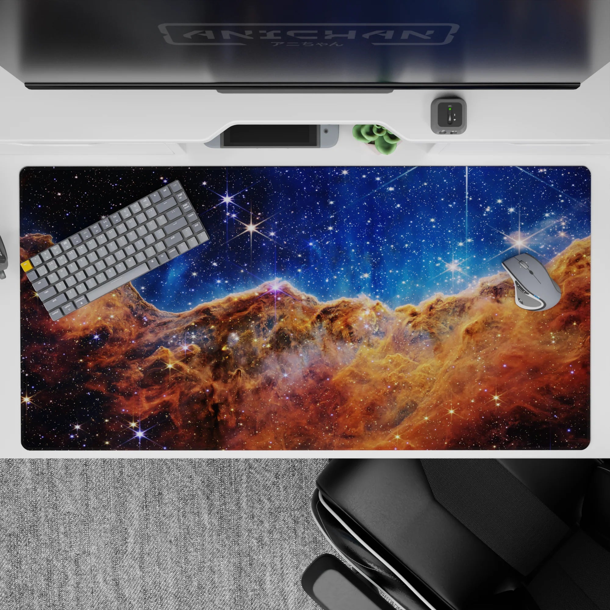 Galaxy themed desk pad with starry night sky design, deep blues and amber clouds, size 40x20 inches.