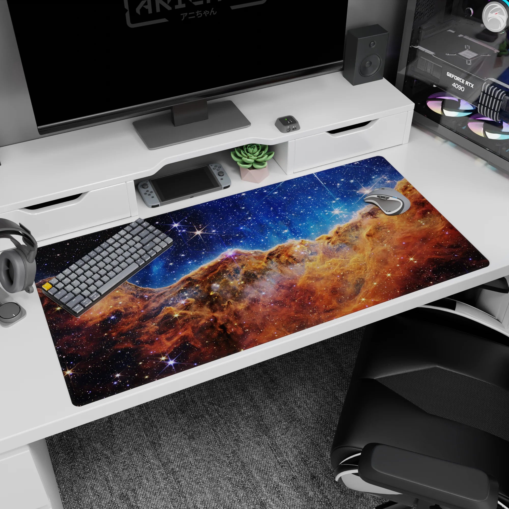 Galaxy-themed desk pad with deep blue nebula design, smooth surface, and spacious 40x20 inches size.