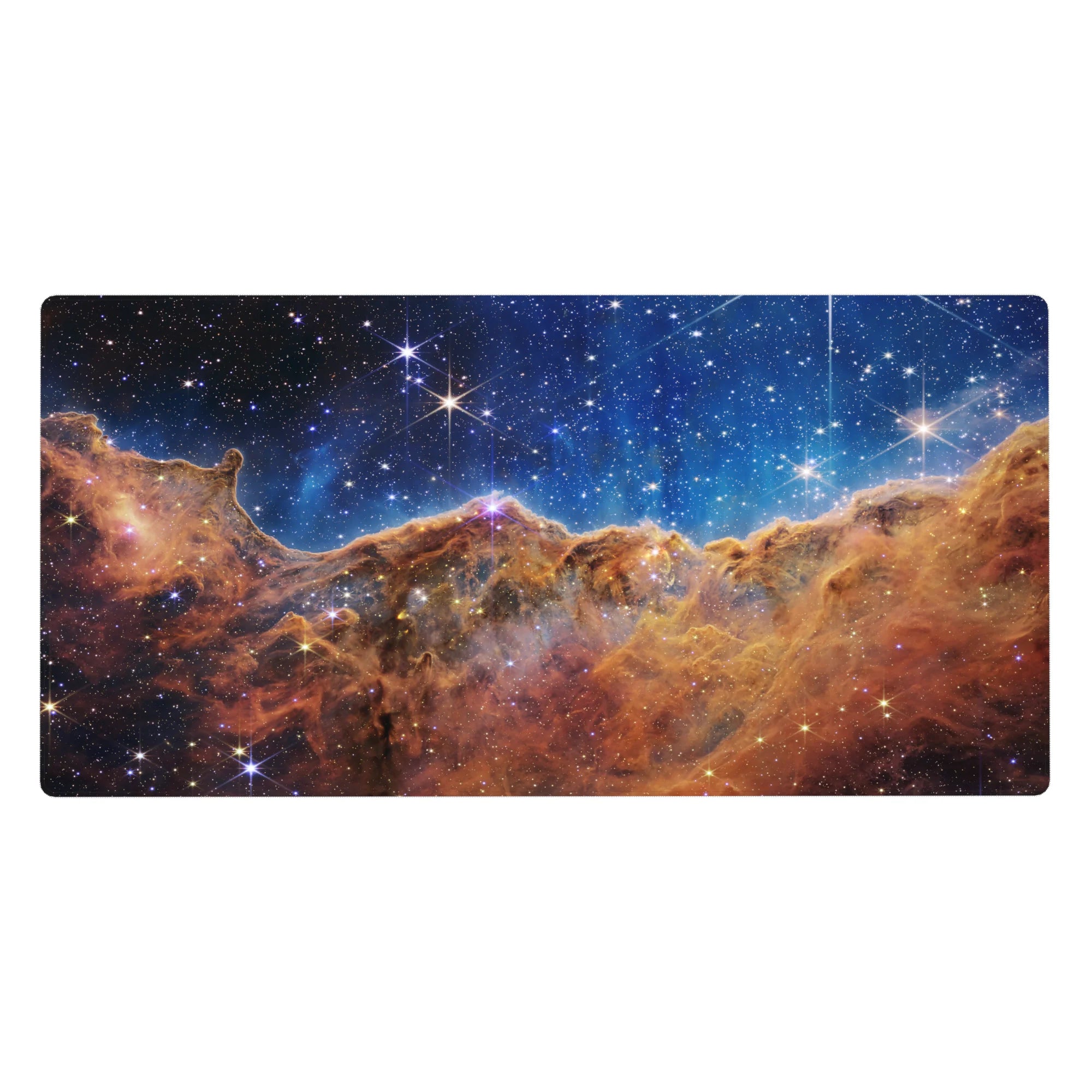 Galaxy-themed desk pad 40x20 inches with starry night sky design, deep blues, amber nebula clouds, and smooth surface.