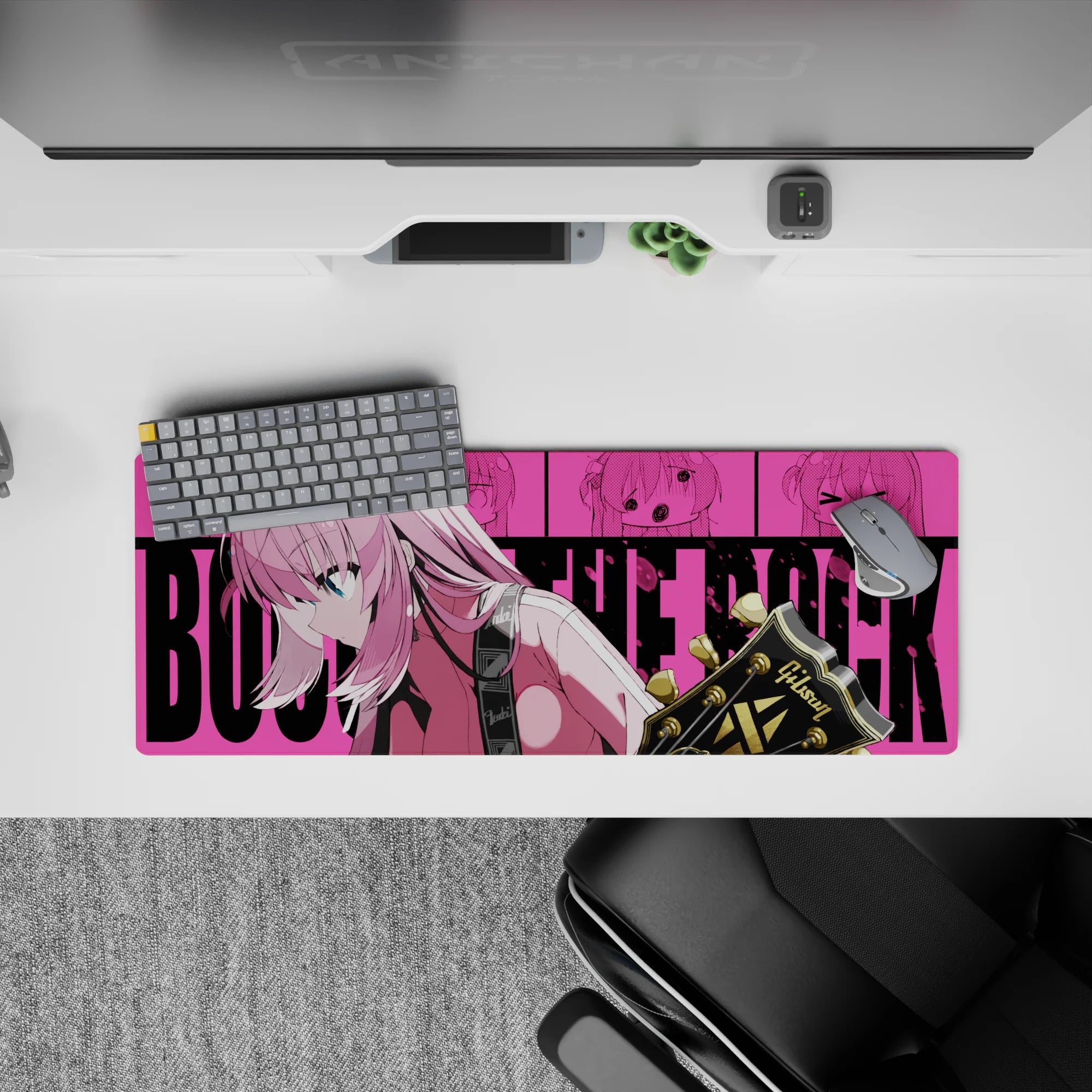 32x12 inches anime desk mouse pad in hot pink and teal, comic-pop background, clean rock vibe.