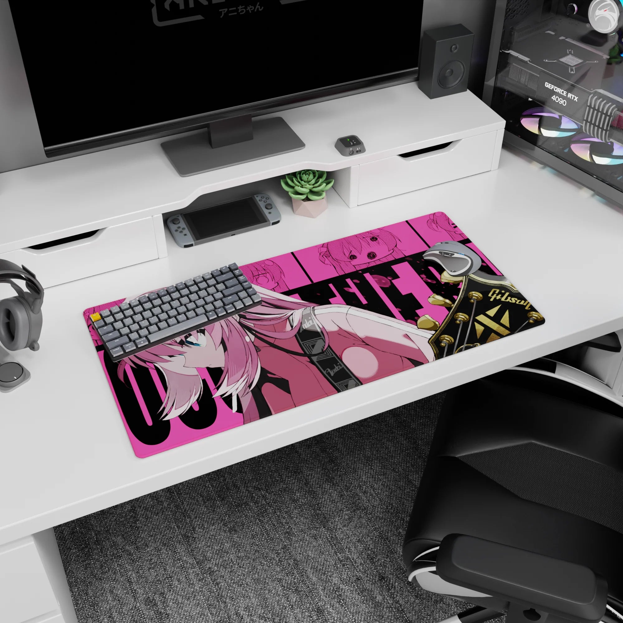 32x16 inches anime girl mouse pad showing focused pink-haired girl leaning in, guitar headstock at frame edge.