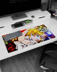 Meliodas 32x16 inches mouse pad from The Seven Deadly Sins with cheeky grin and tilted action pose.