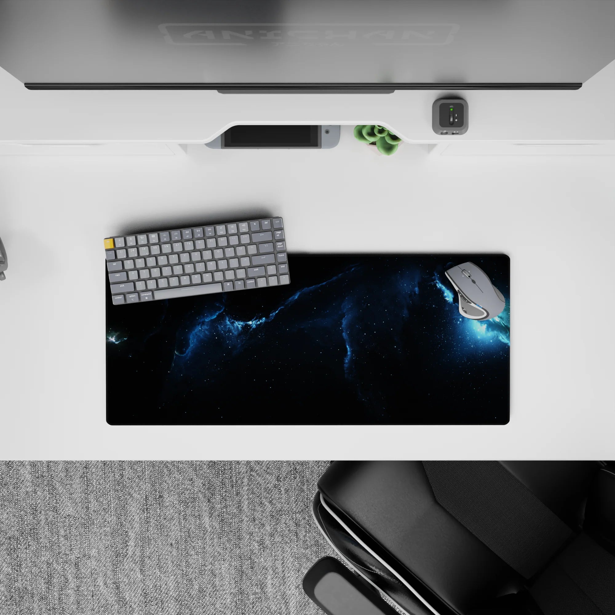 Deep space mouse pad in inky black and stormy blue tones, calm late-night vibe, 28x12 inches.