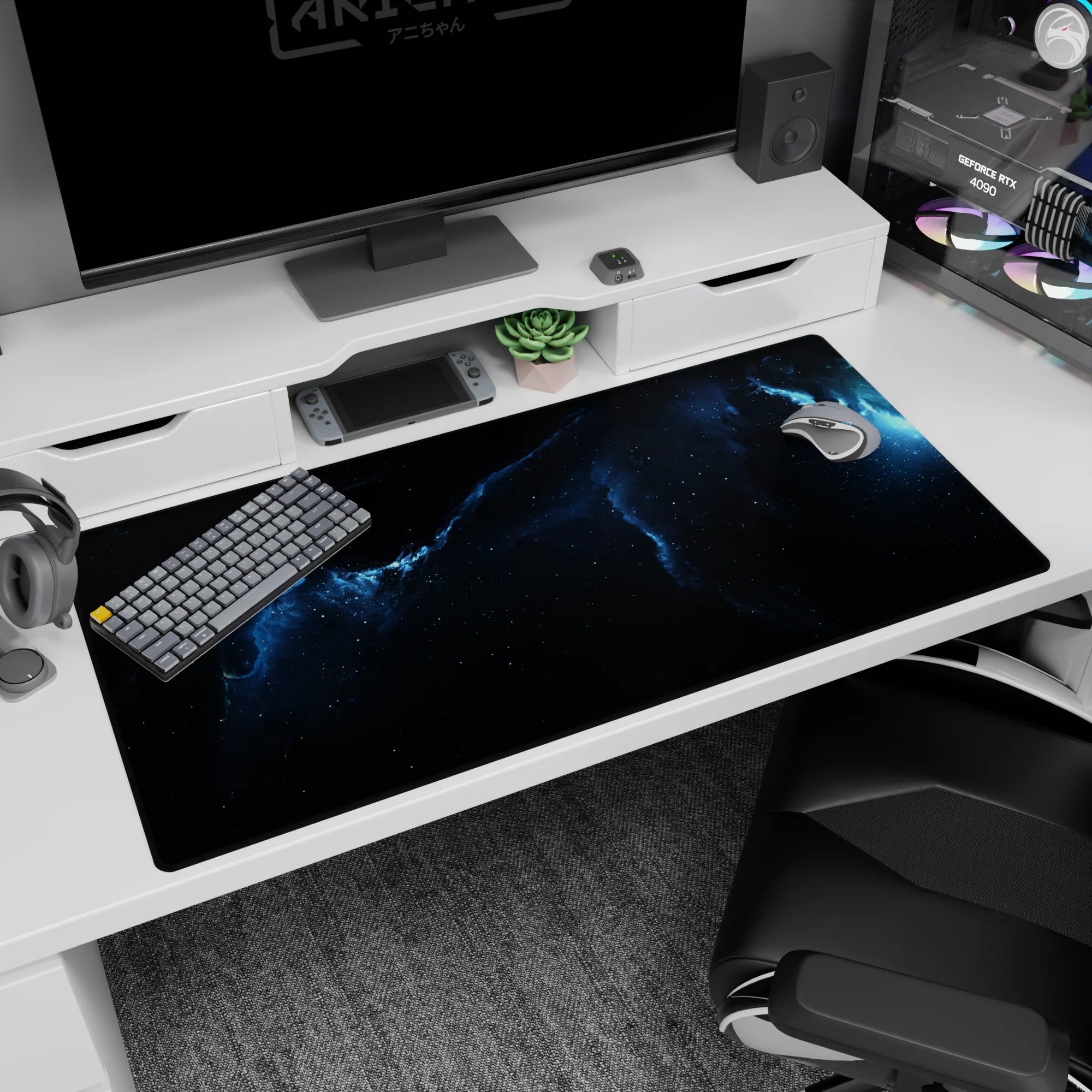 Glowing nebula ribbon desk pad 40x20 inches featuring tiny star-specks across a deep space scene.