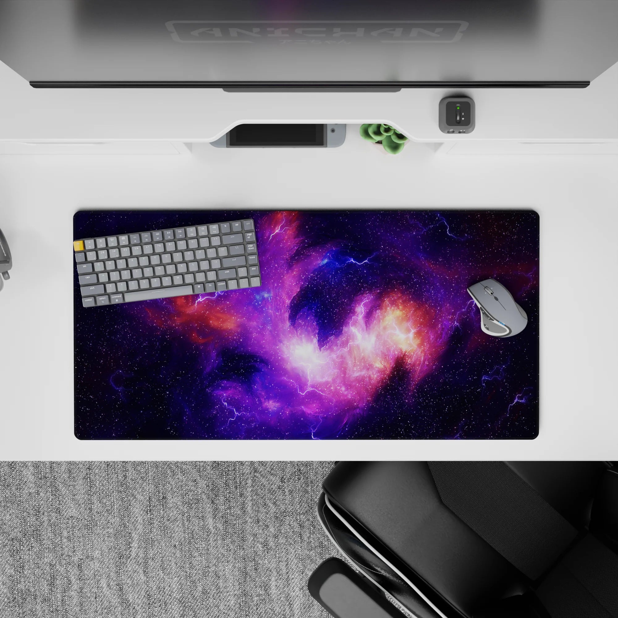 Calming space vibe mouse pad 32x16 inches in deep violet, electric lilac, and warm orange nebula glow.