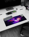 Starry cosmic clouds with zigzag lightning lines on dark backdrop mouse pad, 28x12 inches.