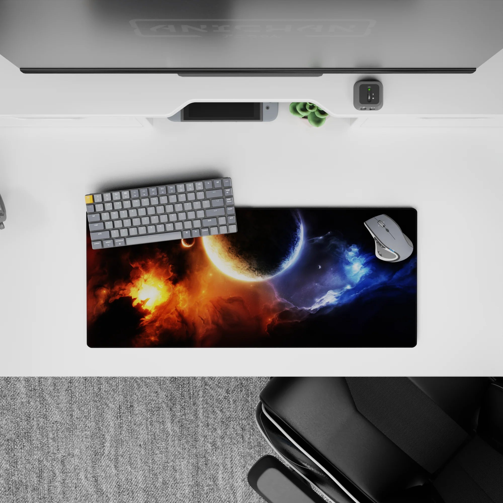 Midnight black mouse pad 28x12 inches with blazing orange nebula and icy blue smoke, calm cosmic mood.