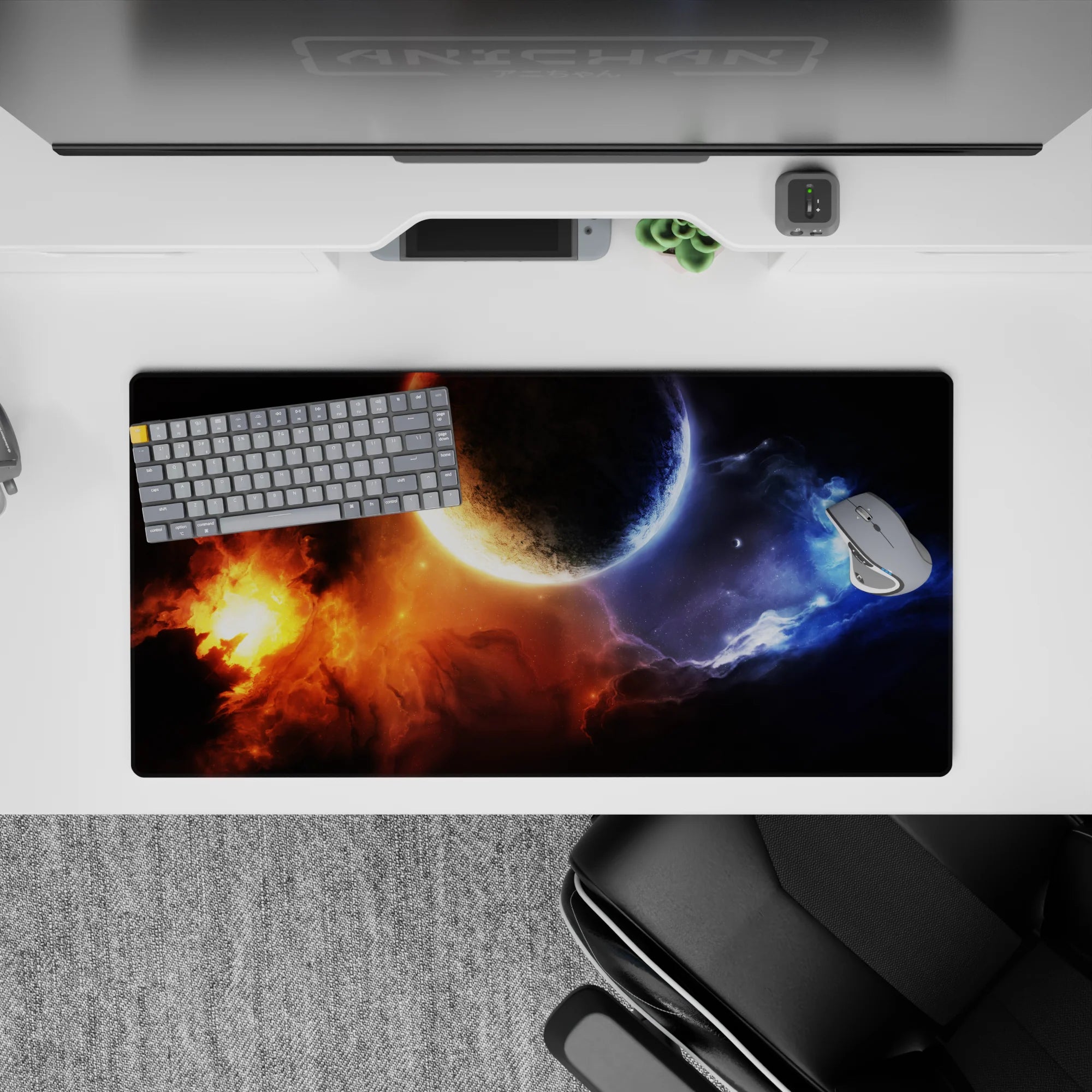 Moody space mouse pad 32x16 inches in midnight black, blazing orange glow, and icy blue haze.