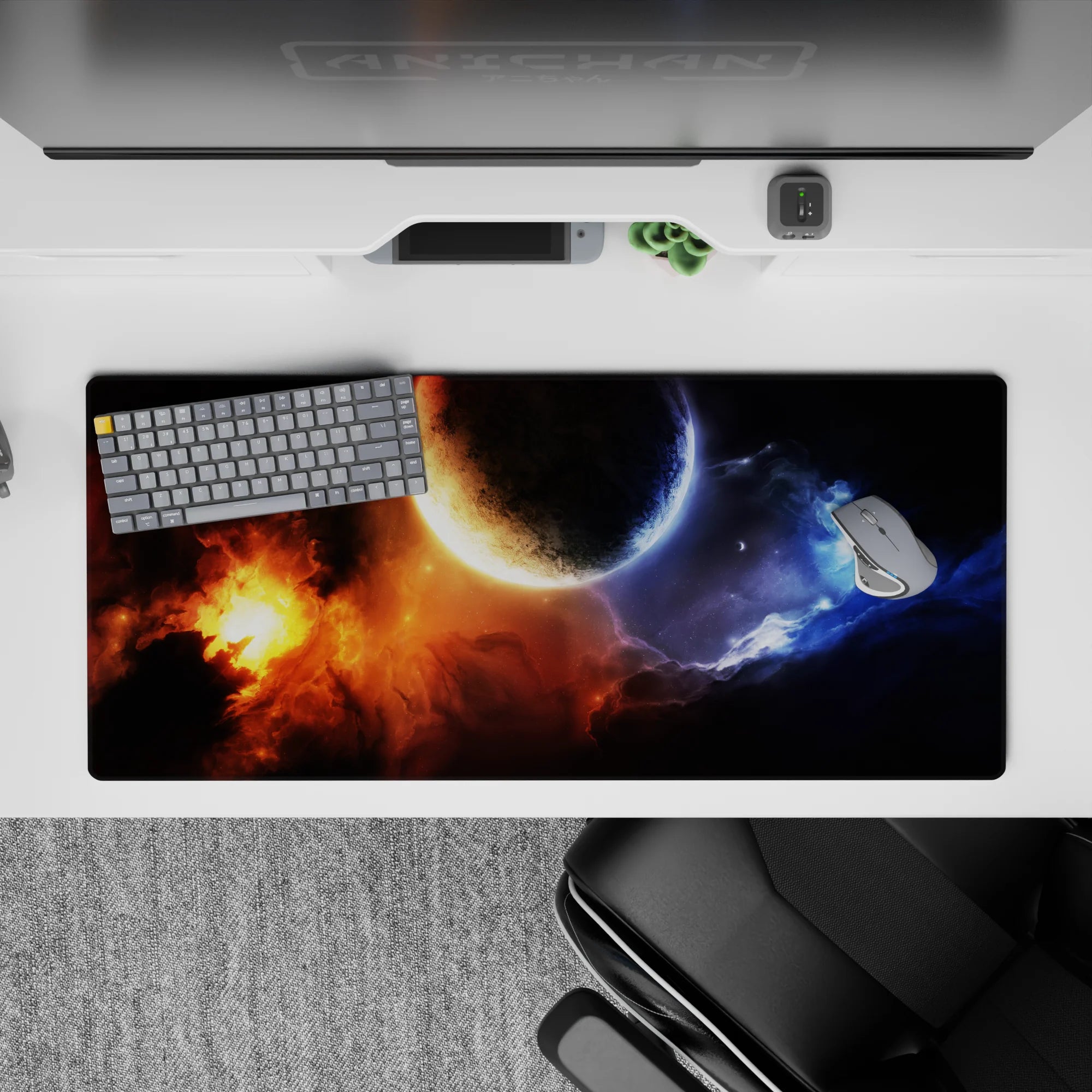 Moody 36x16 inches desk pad in midnight blacks with blazing orange glow and icy blue smoke tones.