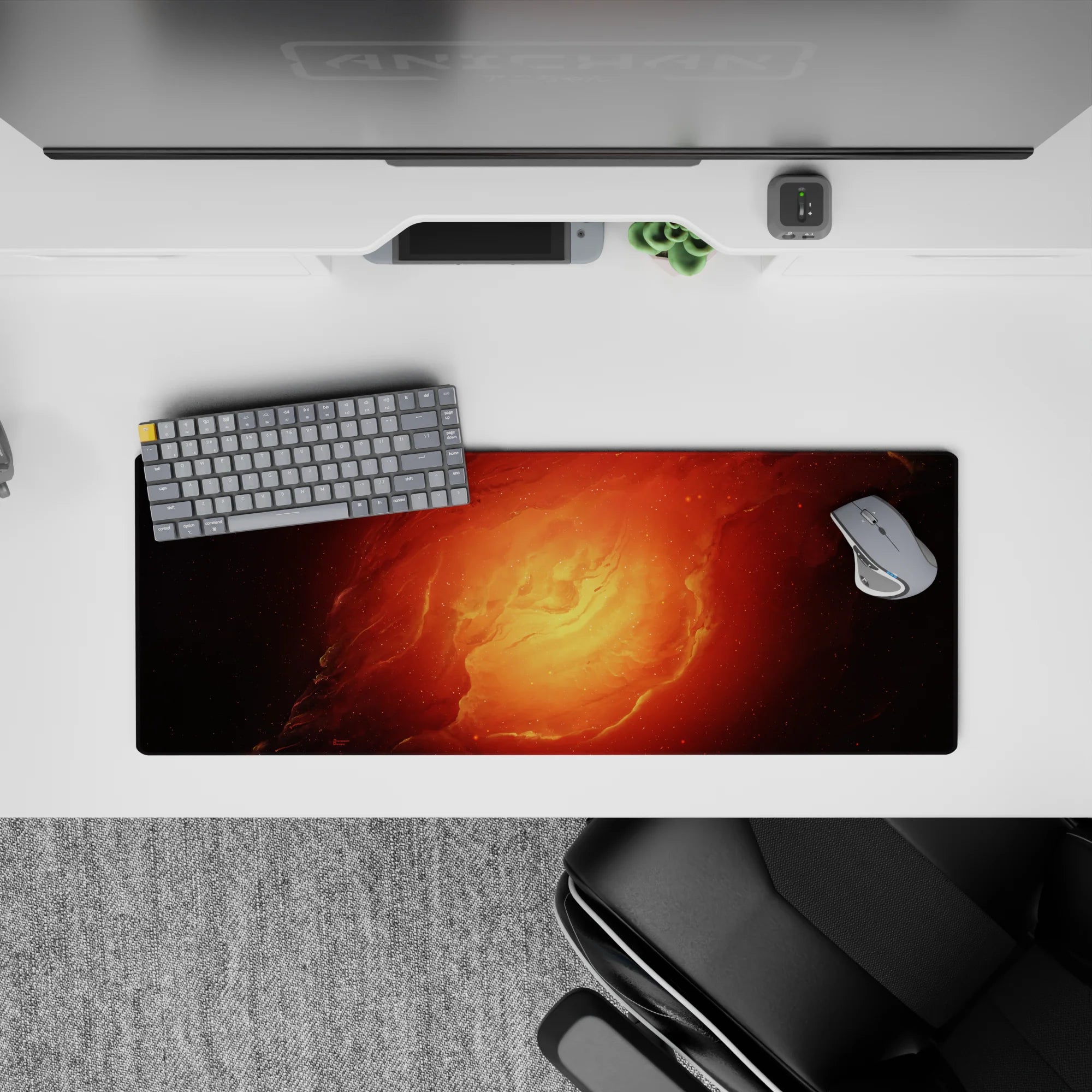 Warm molten orange and ember red mouse pad 32x12 inches with cozy fiery glow fading into shadow.
