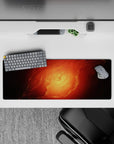 Warm molten orange and ember red mouse pad 32x12 inches with cozy fiery glow fading into shadow.