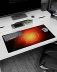 Spiral nebula scene mouse pad 32x16 inches with soft rings swirling inward and starry flecks.