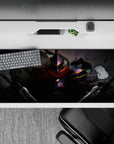 36x16 inches anime desk pad in smoky grays with crimson scarf and neon glitch edges, electric dark mood.
