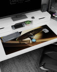 Sleek starship cruising past a ringed planet with tiny lights, desk pad 36x16 inches.