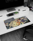 Silver-haired angel reaches forward on anime mouse pad 28x12 inches, layered white feathers and steady gaze.