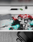 36x16 inches anime desk pad in red and icy cyan ink splashes, bold contrast, intense calm vibe.