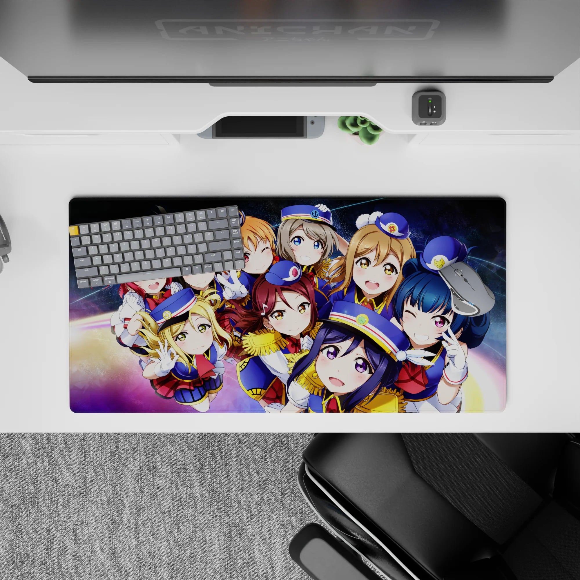 Galaxy swirl anime girl mouse pad 32x16 inches with deep space blues and rainbow glow, cheerful cute vibe.