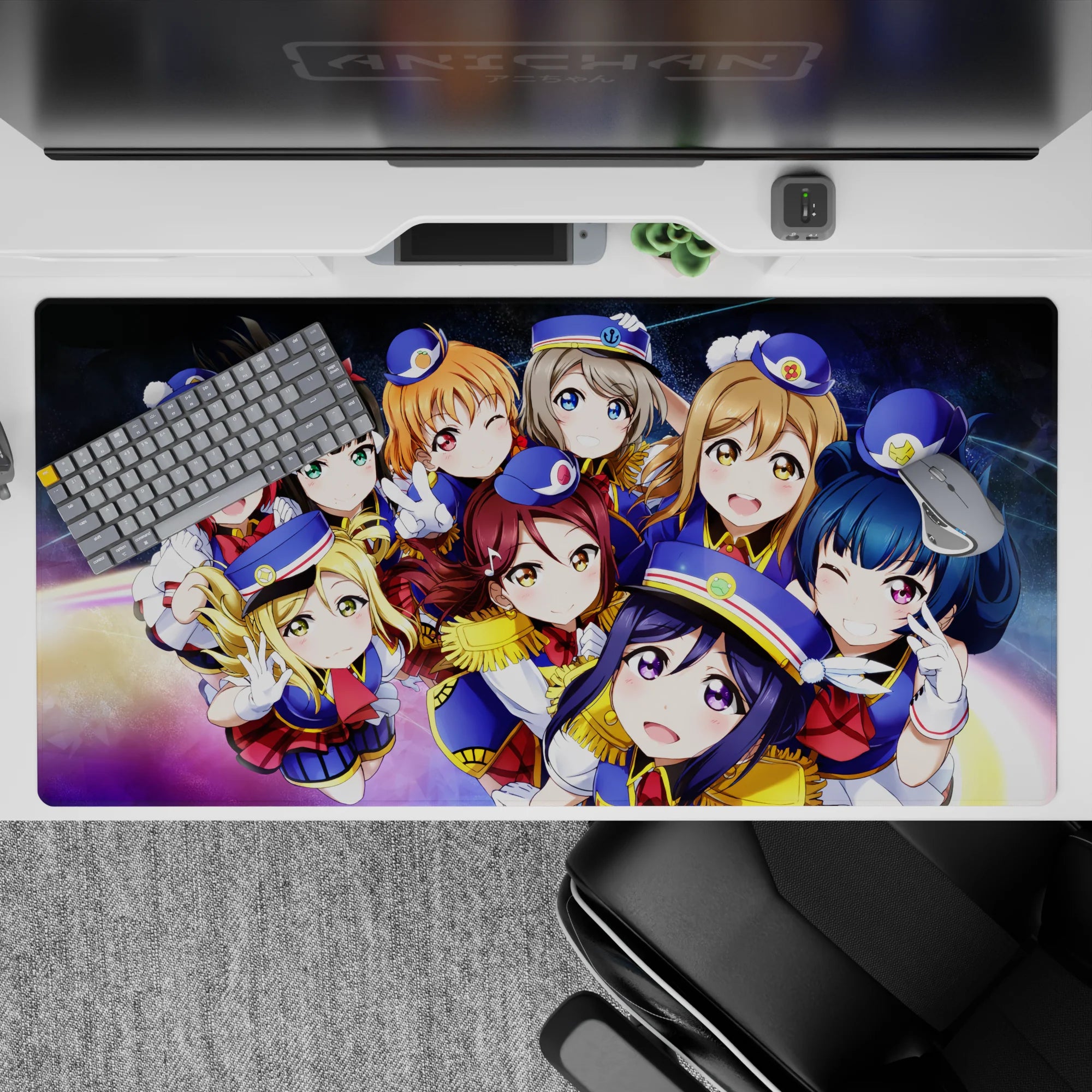 Galaxy swirl anime girl desk pad 40x20 inches in deep space blues with rainbow glow, cheerful vibe.