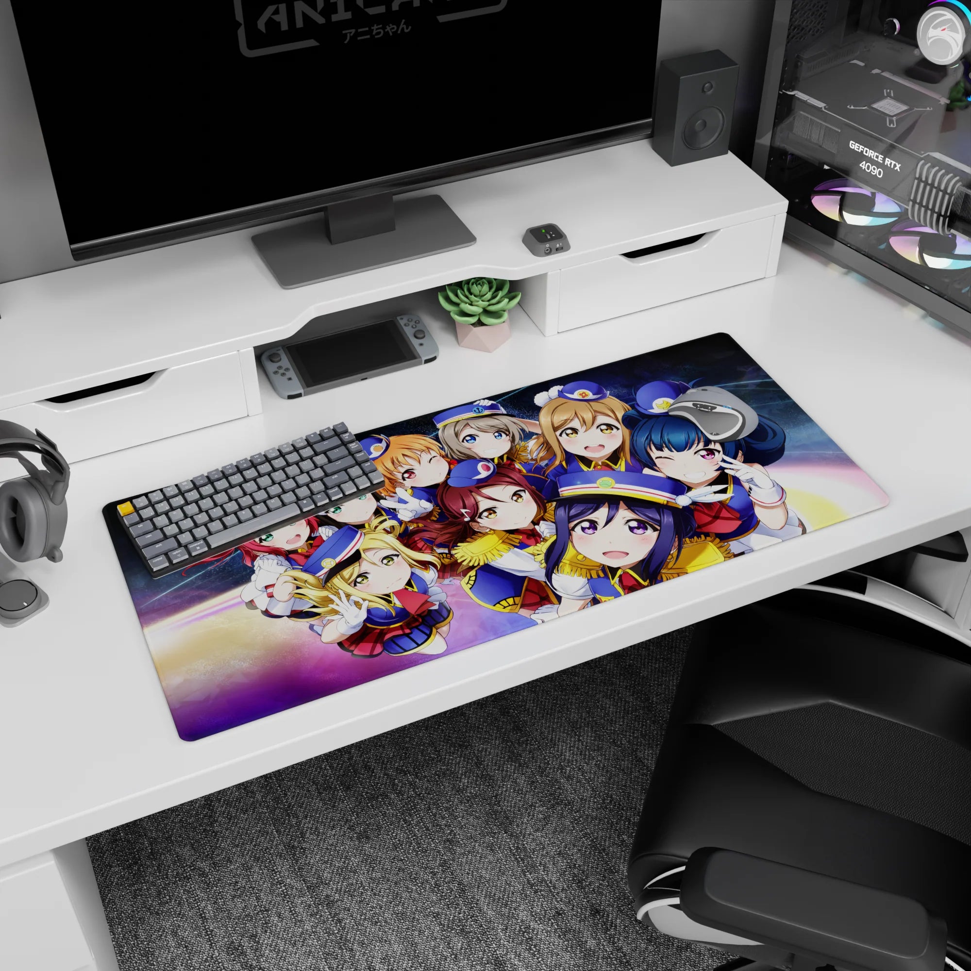 Nico Yazawa and μ's squad smiling in crisp school uniforms on a space backdrop desk pad, 36x16 inches.