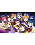 Love Live anime girl desk pad 40x20 inches with nine idols in navy uniforms on a galaxy swirl.