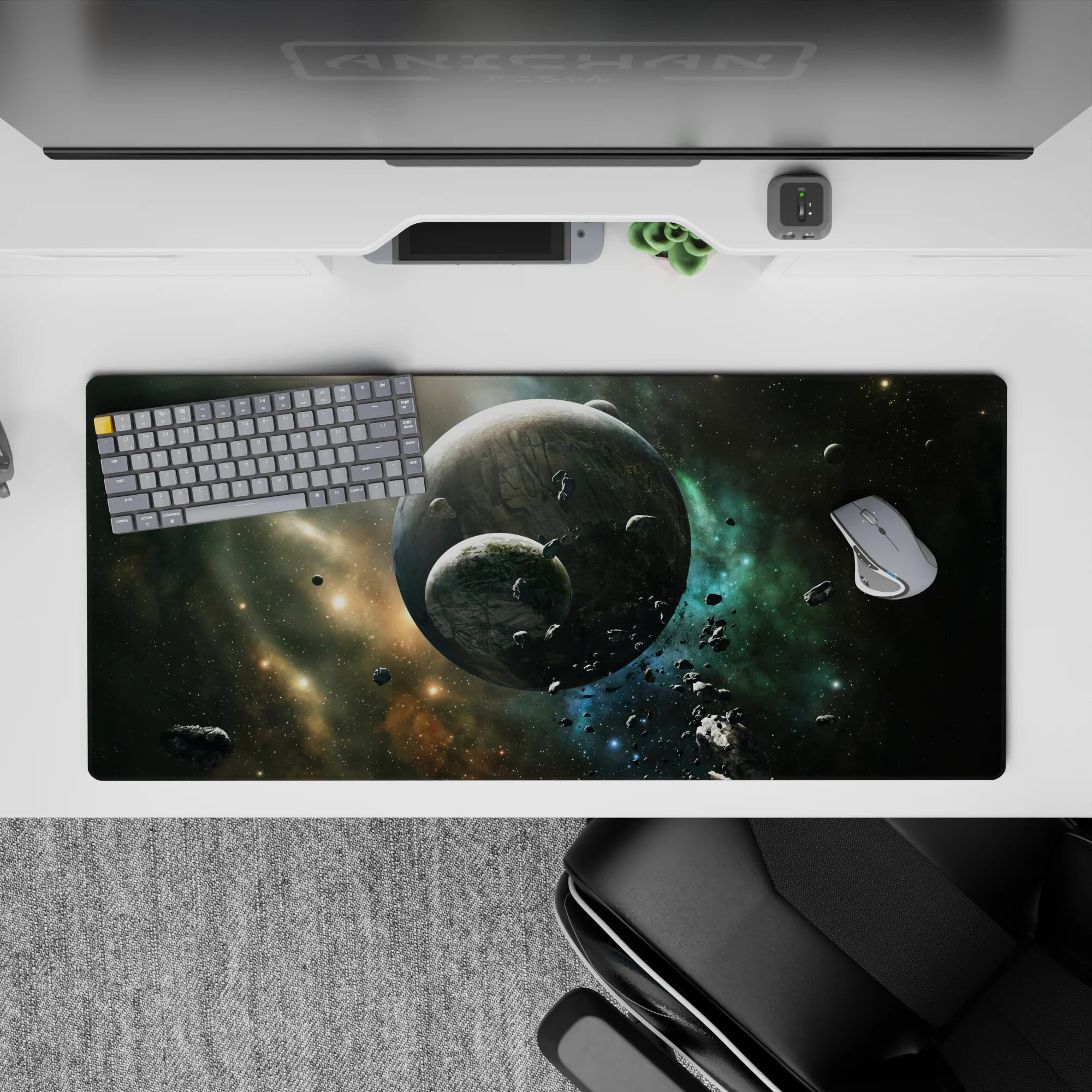 Calming teal nebula desk pad 36x16 inches in smoky black with stardust gold accents, night-sky mood.