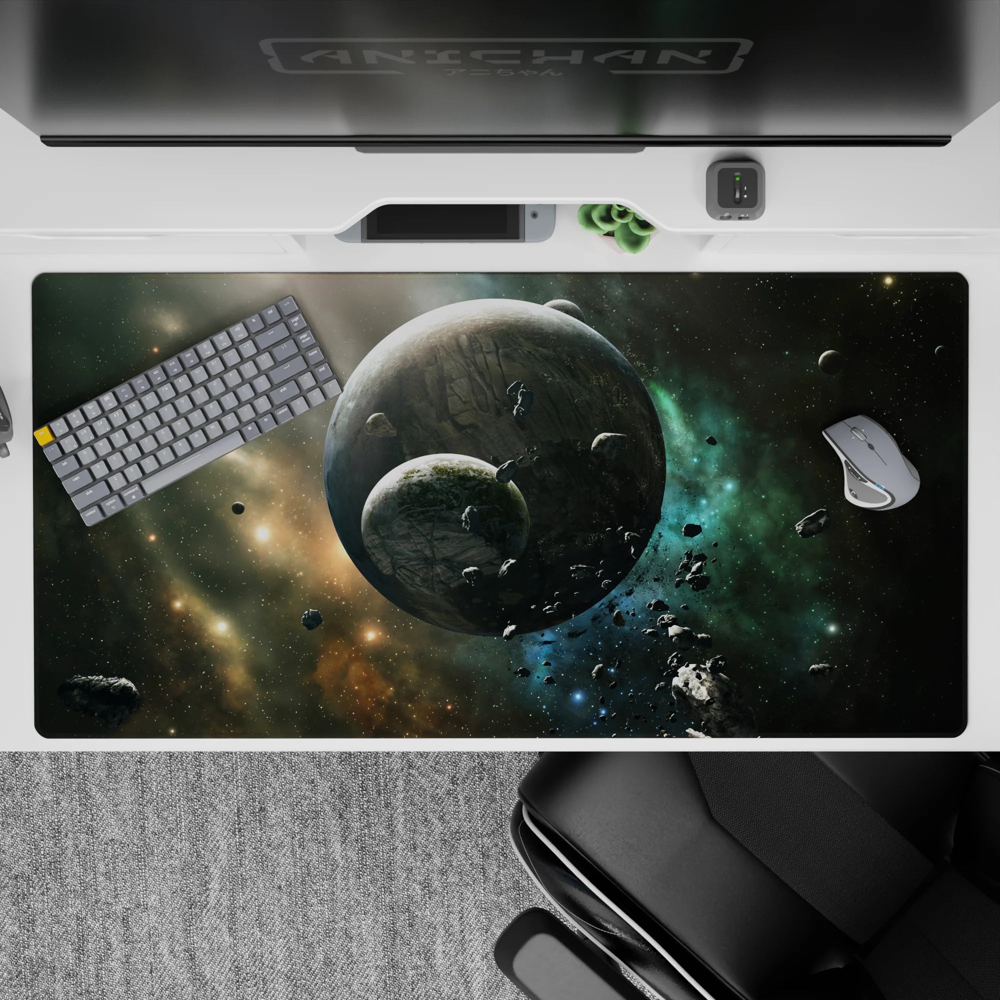 Calm cosmic desk pad 40x20 inches in smoky black, stardust gold, and cool teal for a night-sky vibe.