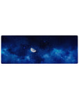 Midnight galaxy desk mouse pad 32x12 inches with swirling sapphire clouds and scattered star pattern.