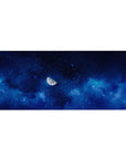 Midnight galaxy desk pad 36x16 inches with sapphire clouds, scattered stars, and soft blue gradients.