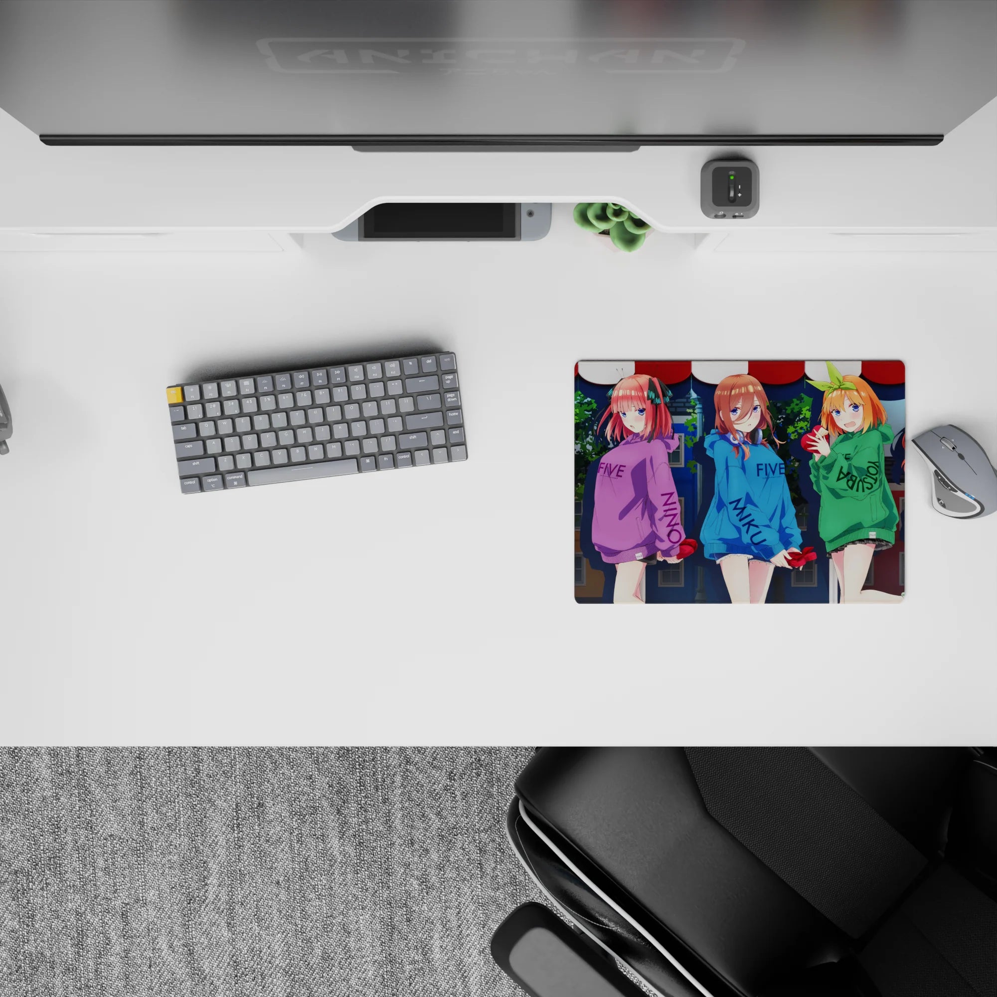 Vibrant 14x10 inches anime girl mouse pad in yellow, purple, blue, green, and red hoodies, cozy vibe.
