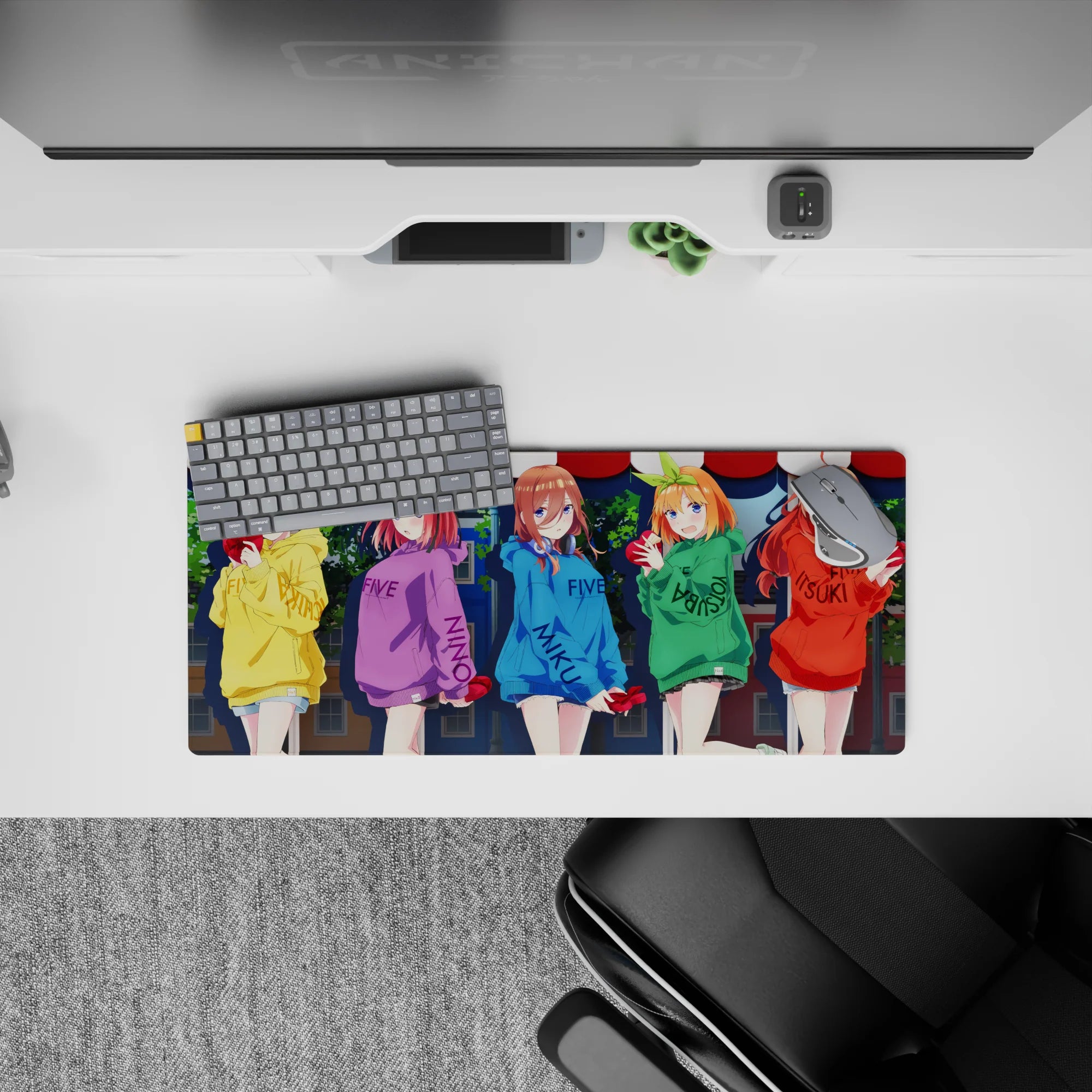 28x12 inches anime girl mouse pad in bright yellow, purple, blue, green, red hoodies with warm shy vibe.